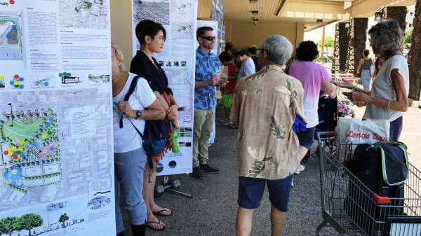 ASU students presenting park designs to community at neighborhood grocery store