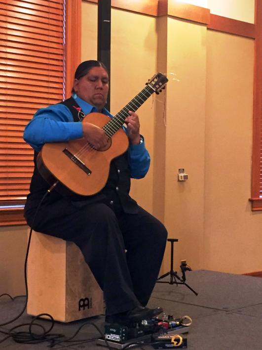 Classical guitarist Gabriel Ayala plays at the RED INK Sustainability Dinner on April 22, 2017. / Photo by Henry Quintero