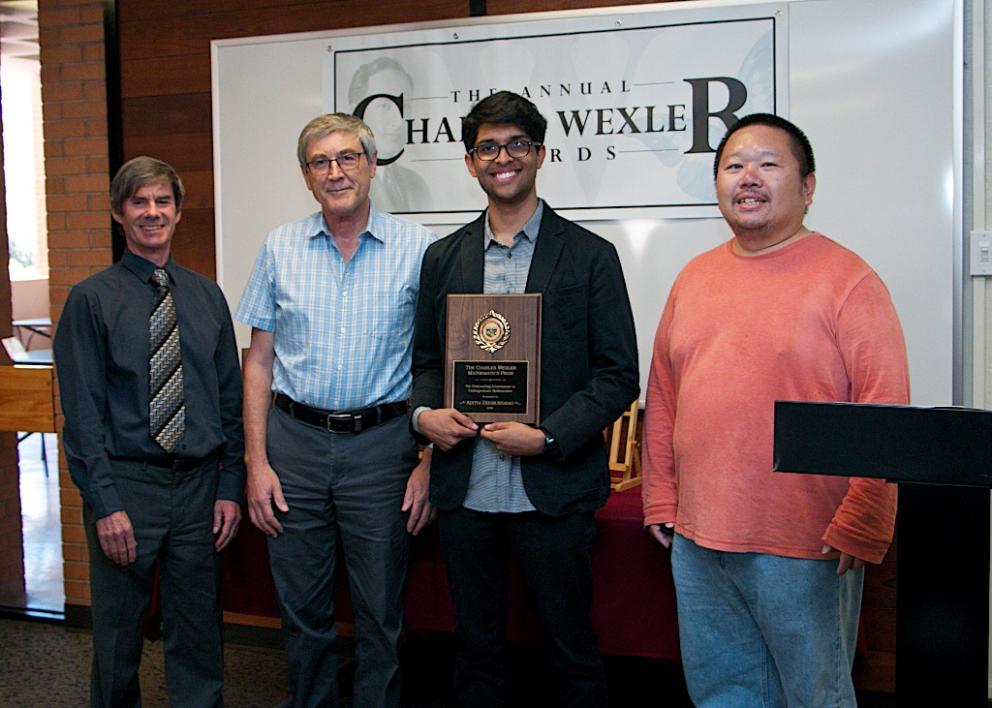 Aditya Dhumuntarao receiving the Charles Wexler Mathematics Prize