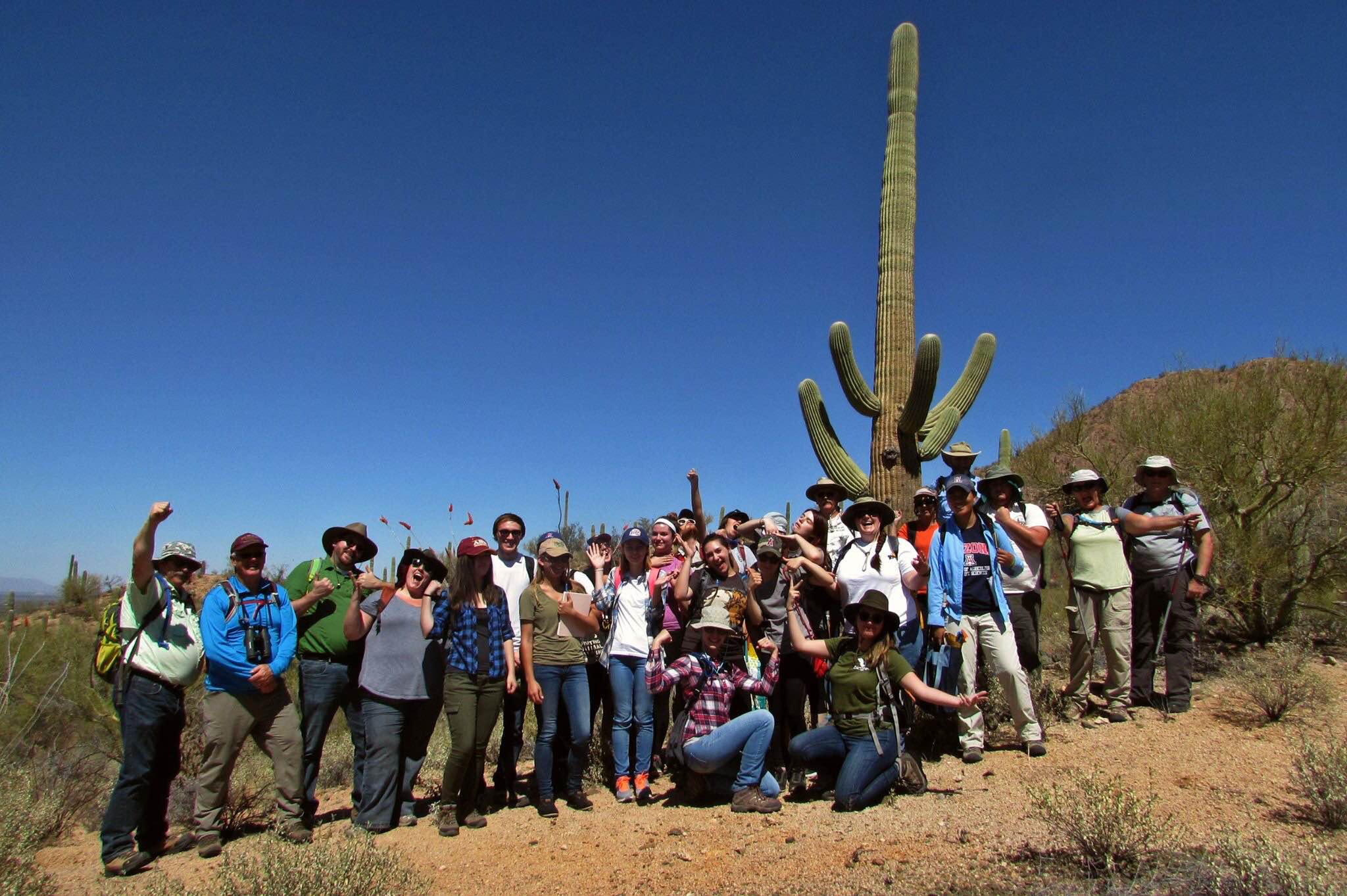 A group of bio students pose at Saguaro National Park