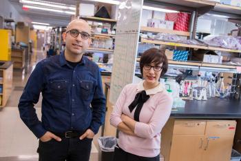 ASU assistant professors Samira Kiani and Mo Ebrahimkhani pose side by side in Dr. Kiani's lab