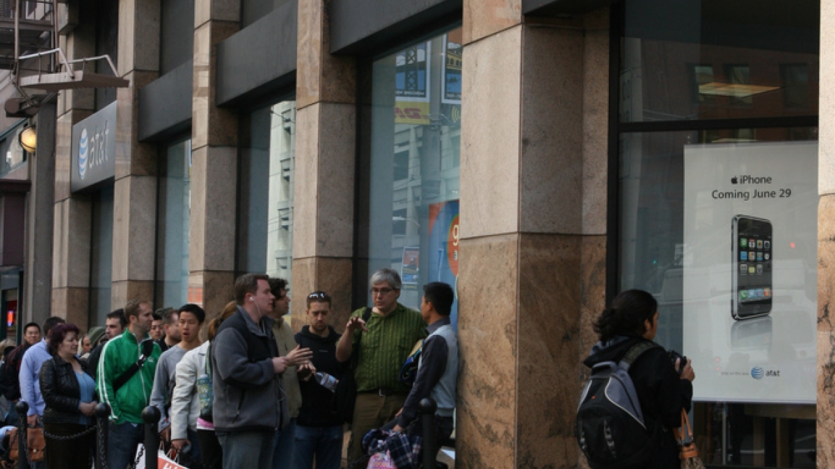 people standing in line in front of AT&T building