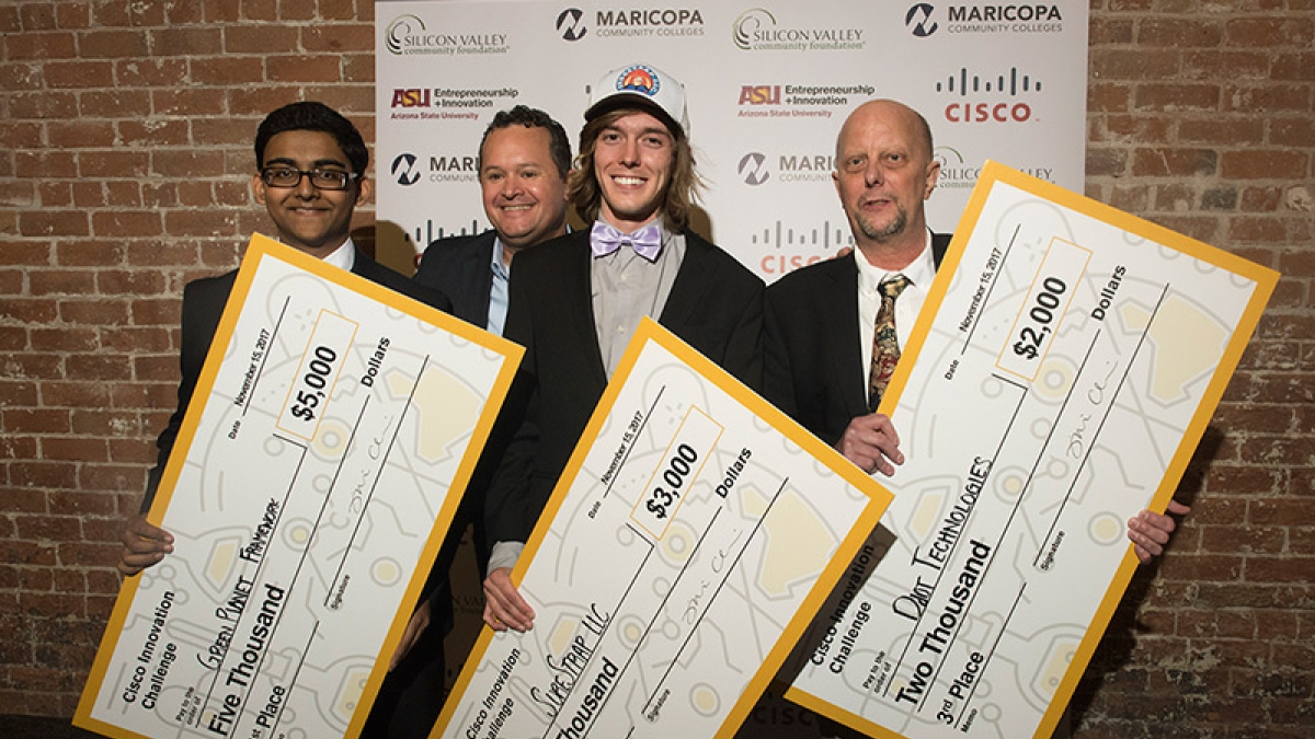 Cisco Challenge winners from left to right: First-place winner, Joshua Parde for Green Plant/Aquifer Systems; second place winner, Cody Constanbader for Sure Strap; and third-place winner, Todd Hoffman for Ddot Technologies.