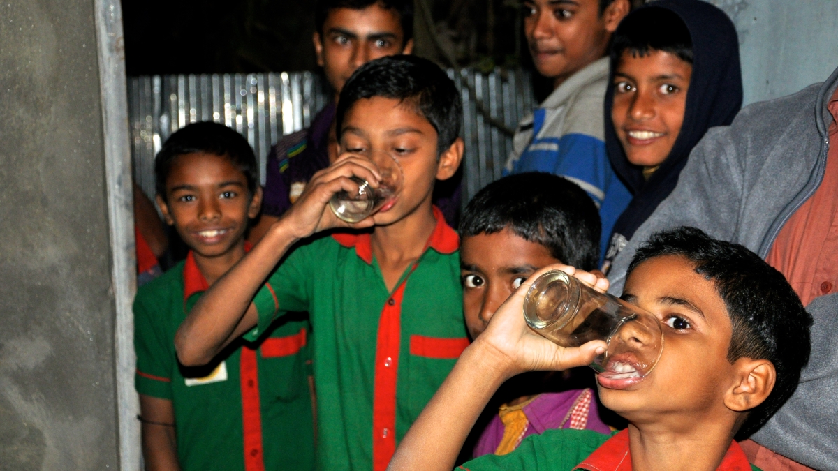 Children drinking water.