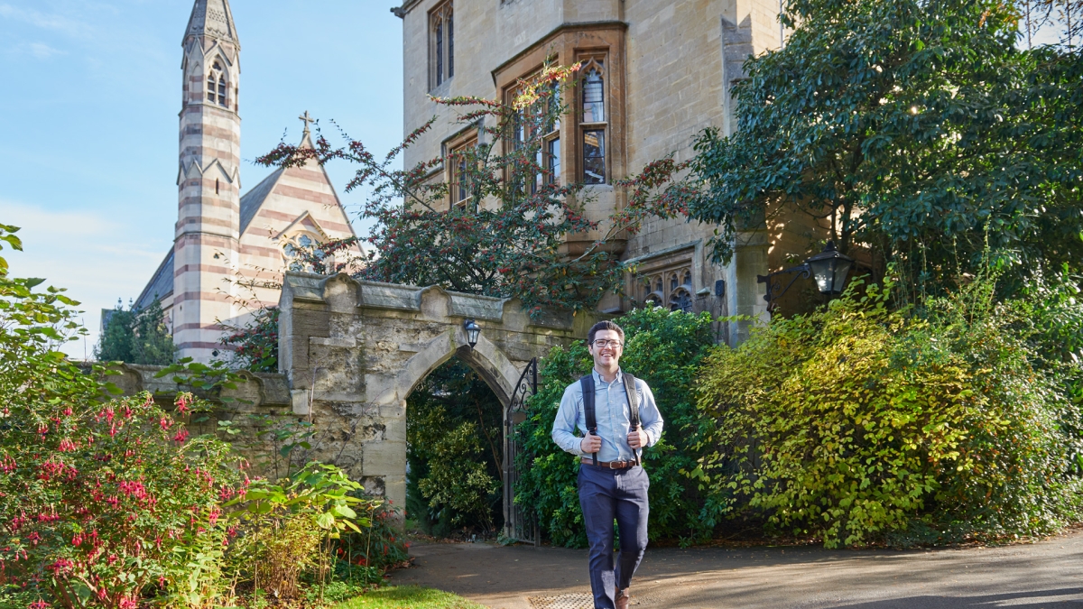 A student walks through Oxford