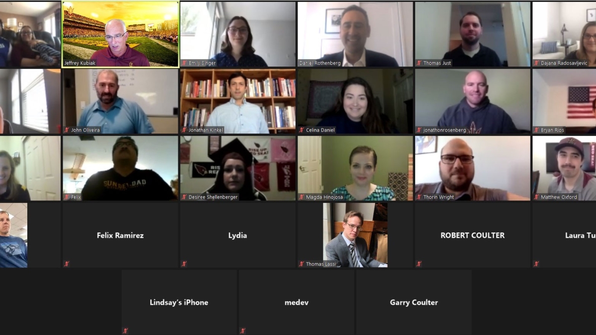 screen capture of several people in an online Zoom meeting