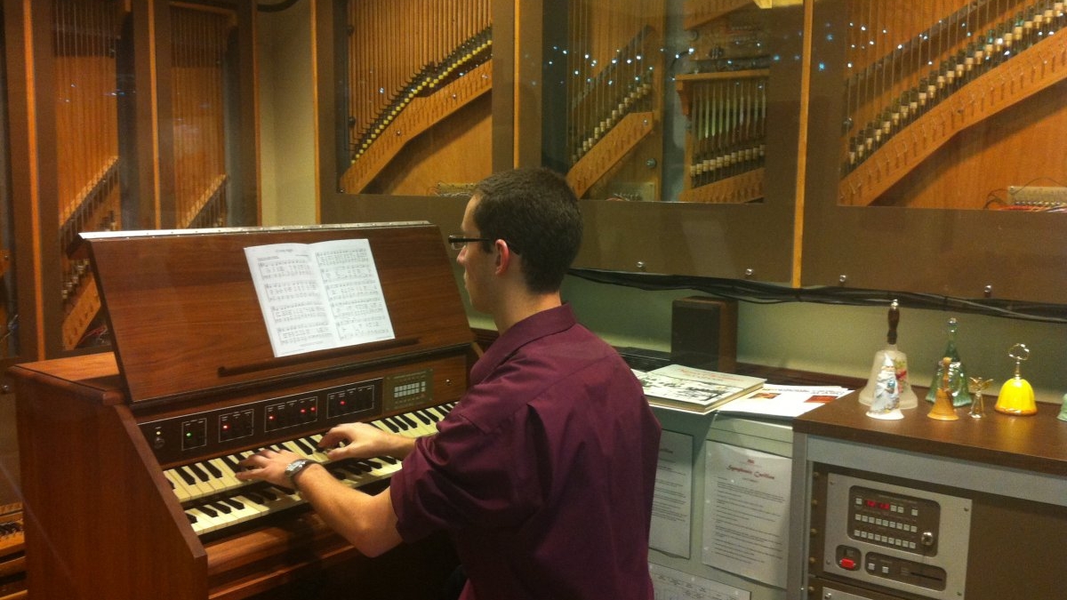 student playing a carillon