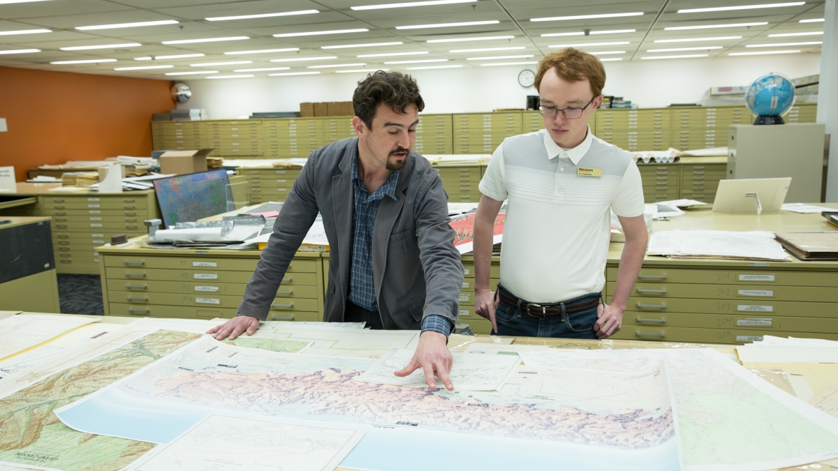 Matt Toro ASU examines Grand Canyon maps