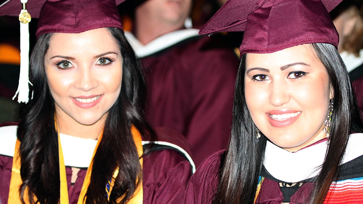 Ana Perez and Mariela Diaz received their graduate degrees in December 2014