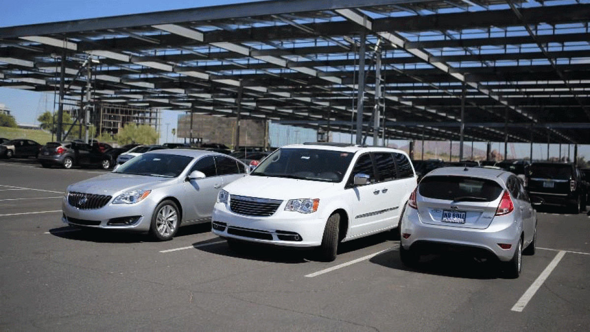 Researchers monitor interior temperatures of vehicles parked in the sun.