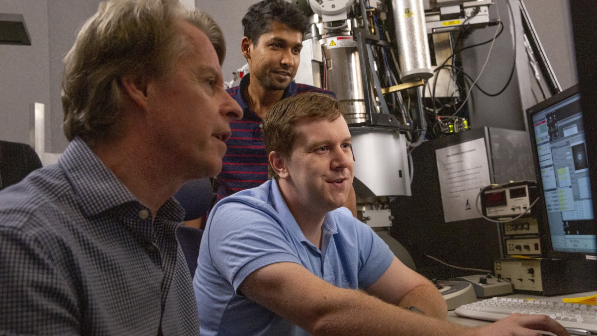 rofessor Peter Crozier and students in electron microscopy center
