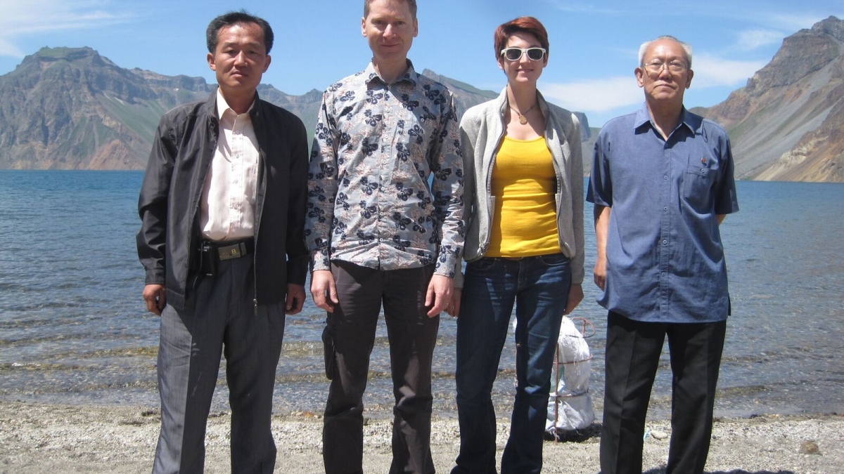 Researchers on the shore of Lake Chon