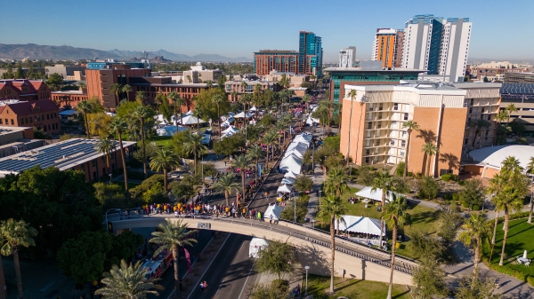 View of homecoming parade in downtown Tempe from a drone