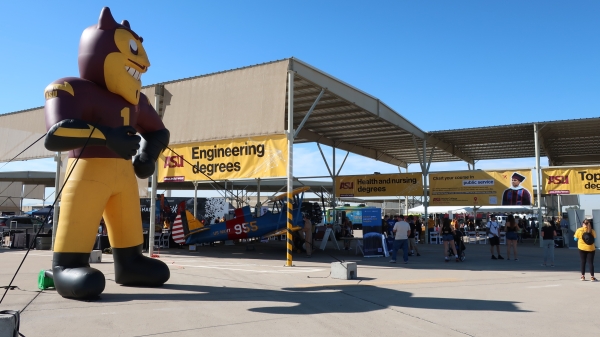 An inflatable Sparky the Sun Devil corners the ASU exhibits at the Luke Days 2024 STEM City.
