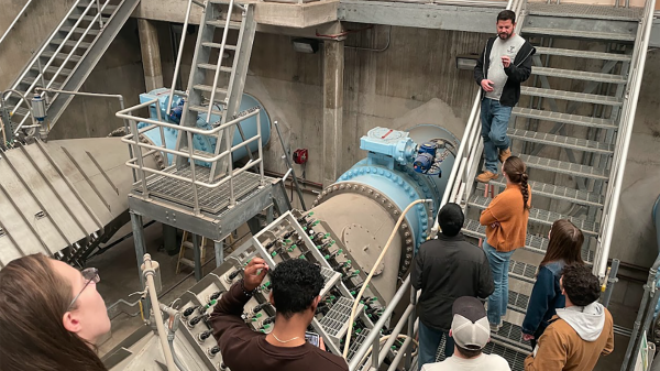 People touring a water treatment facility.