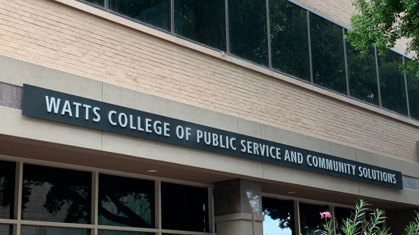 Exterior of a building with a sign that reads "Watts College of Public Service and Community Solutions."