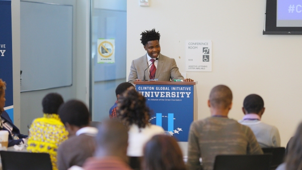 Ngoni Mugwisi presenting in front of fellow MasterCard Foundation Scholars at the Clinton Global Initiative University conference held at the University of California Berkeley.