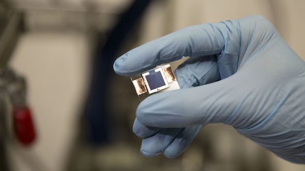 A perovskite/silicon tandem solar cell, created by research teams from Arizona State University and Stanford University, capable of record-breaking sunlight-to-electricity conversion efficiency. Photographer: Pete Zrioka/ASU