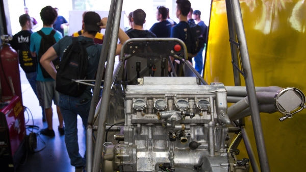 Formula SAE students work in the shop.