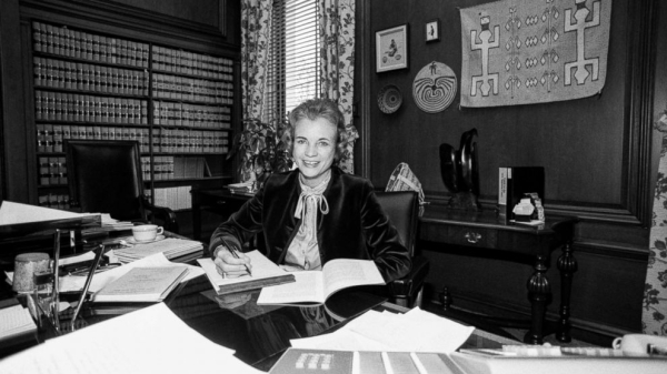 Sandra Day O'Connor in her office in an old black and white photo