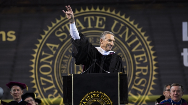 Howard Schultz of Starbucks flashes the pitchfork at ASU undergrad commencement