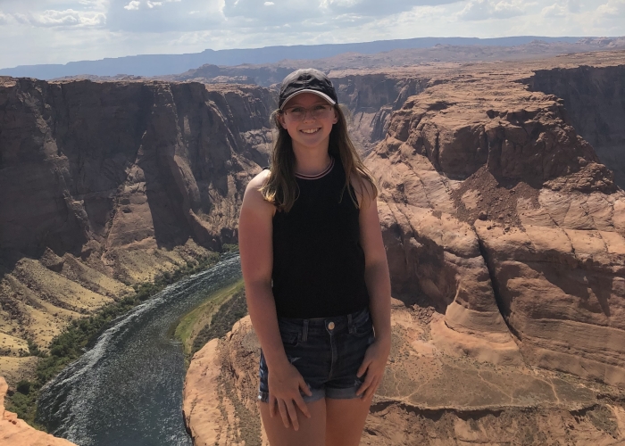Photo of graduating student, Hannah McGraw, at the Grand Canyon