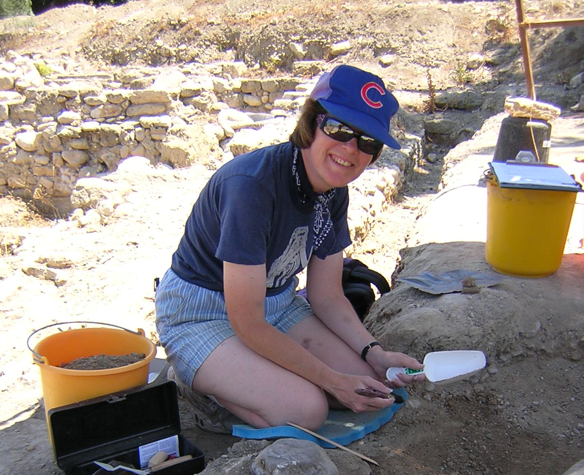 photo of Baker excavating at a field site