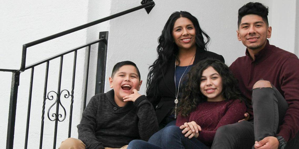 Carmen Trujillo, with her three children, was elected to the Phoenix Elementary School Board.