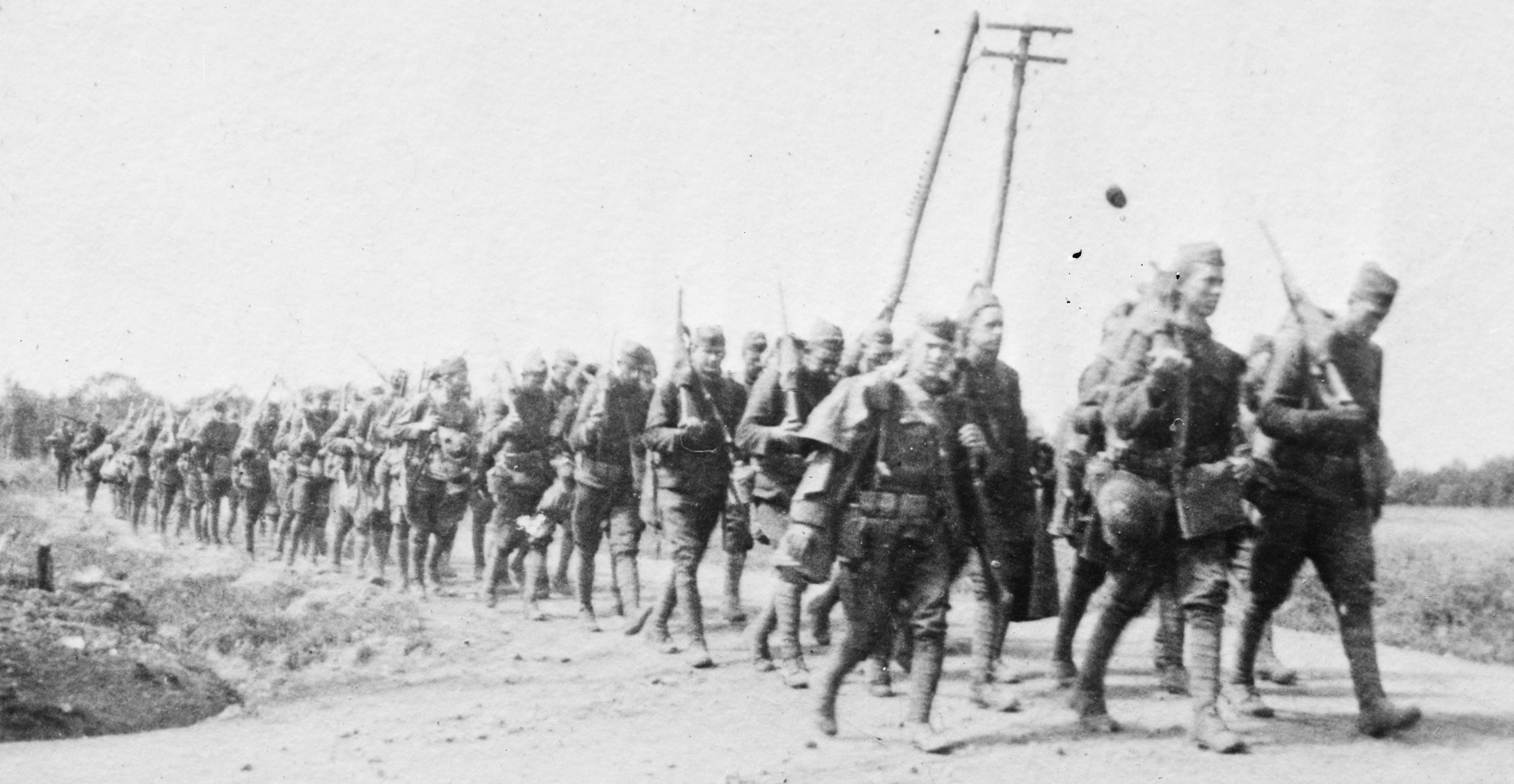 U.S. Soldiers march to Fismes